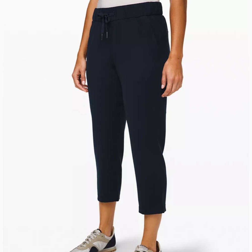 Blue and Green Lululemon Capri On the Fly Mid Rise Crop TravelWoven Pants